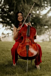 A woman playing a cello